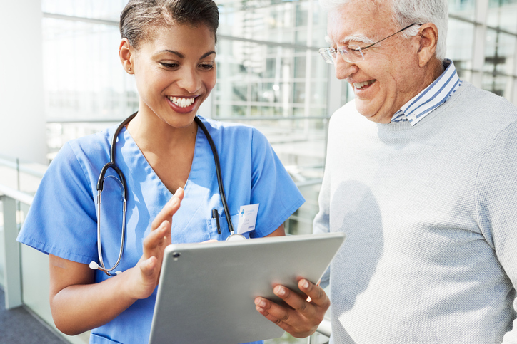 Doctor and patient smiling.